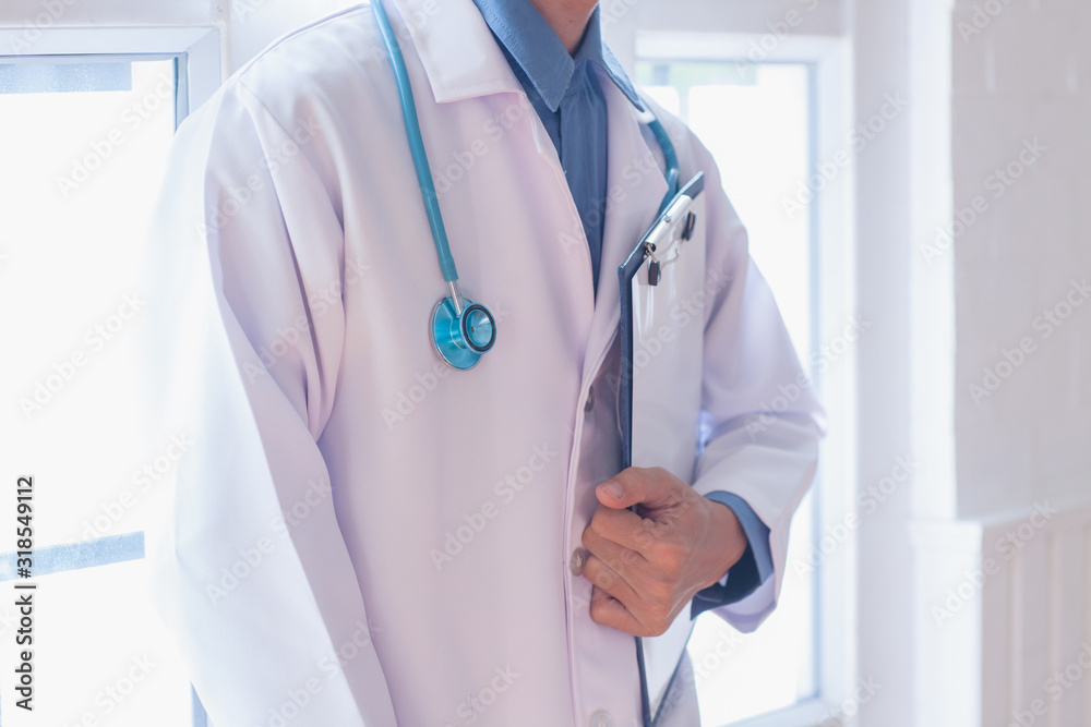 Doctor holding a clipboard,Healthcare and medical concept. Doctor holding a clipboard,Healthcare and medical concept.
