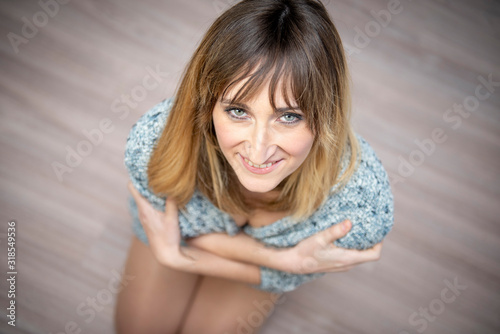 Pretty woman posing for the photographer