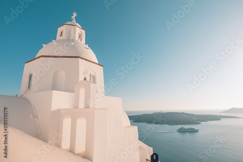 Santorini, Greece. Famous church view of traditional white architecture Santorini landscape with blue sky. Summer vacations background. Luxury travel tourism concept. Amazing summer destination