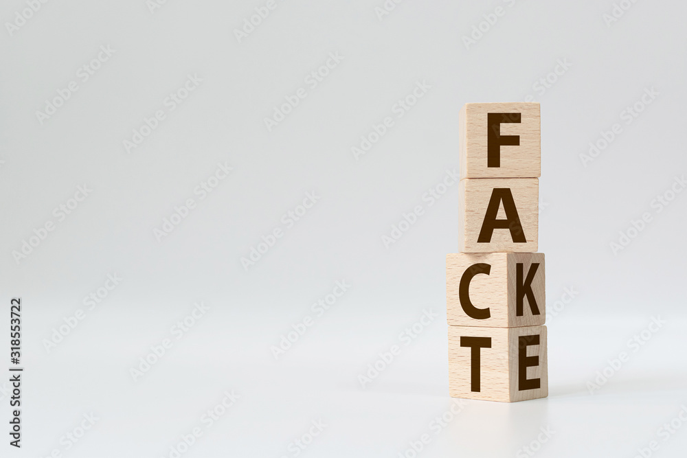 Fact or Fake concept, Wooden cube change the word, April fools day Fact or Fake concept, Wooden cube change the word, April fools day