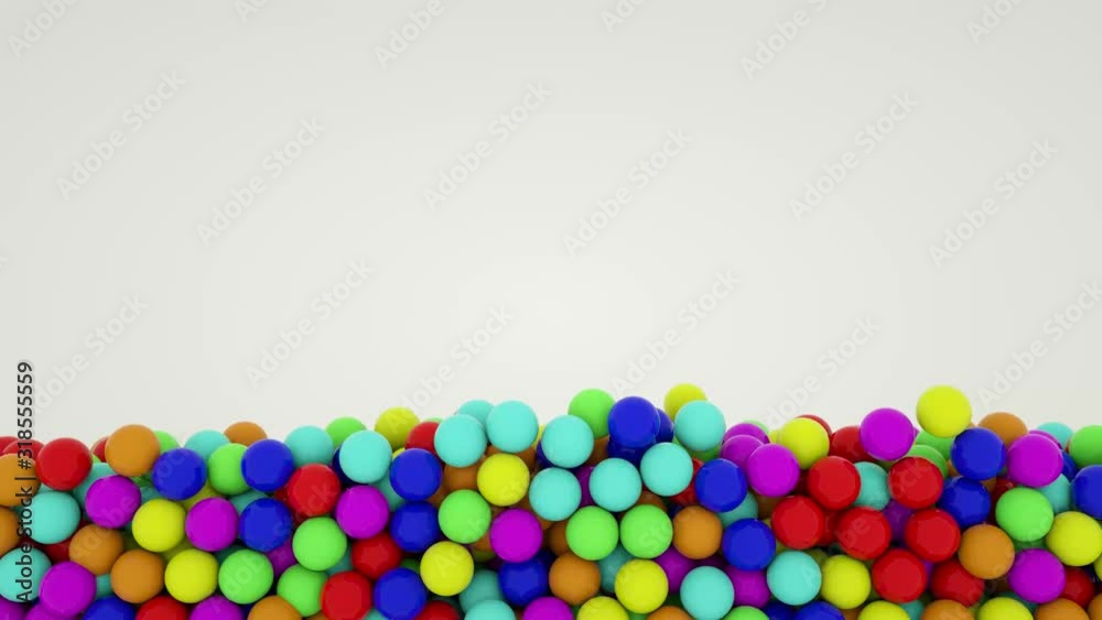 multi-colored glossy balls quickly fill the screen. animated screensaver. 3d render multi-colored glossy balls quickly fill the screen. animated screensaver. 3d render
