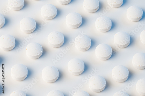Fototapeta Naklejka Na Ścianę i Meble -  white pills on white background with blue lights