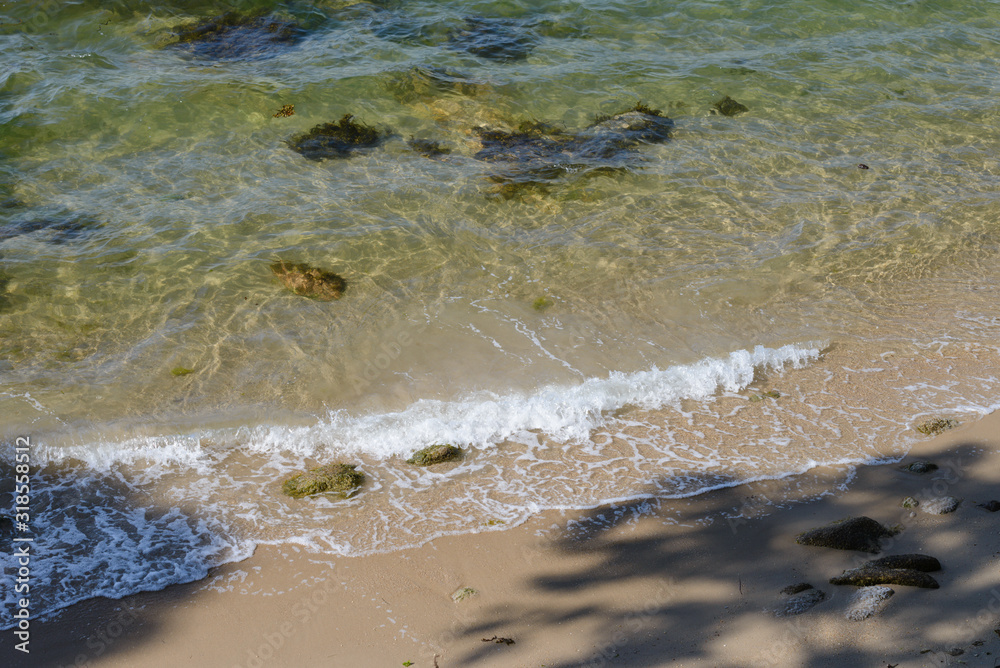 Fototapeta premium beautiful tropical sea beach with stones on the shore
