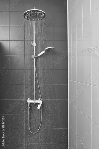 water flows from the shower in bathroom