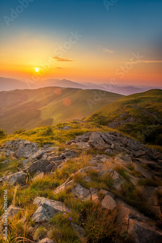 Fototapeta Naklejka Na Ścianę i Meble -  Beautiful summer sunset in the mountains