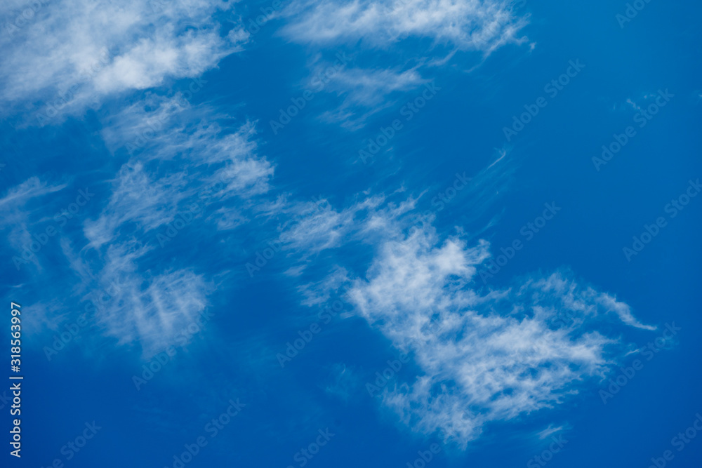 Cloudy with blue sky background