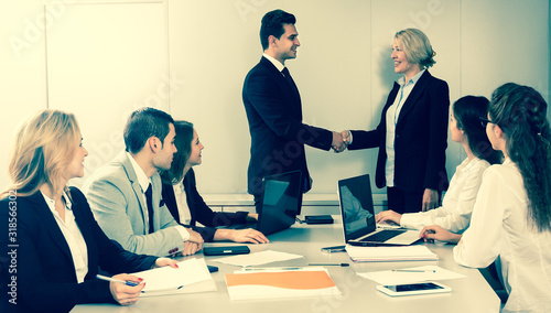 Business handshake at negotiations photo