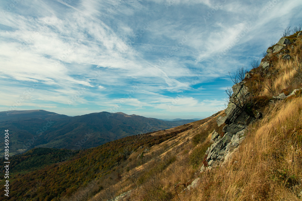 Carpathian mountains steep rocks landscape scenic view autumn time cloudy sky background