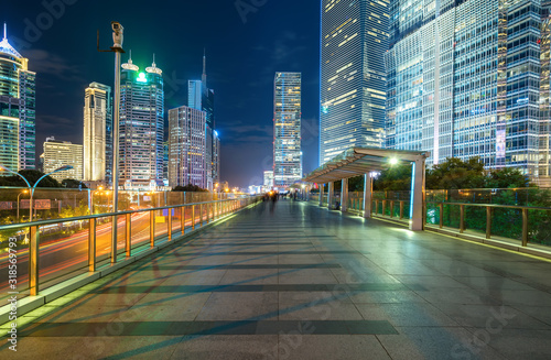 At night, footbridges and skyscrapers in Shanghai, China