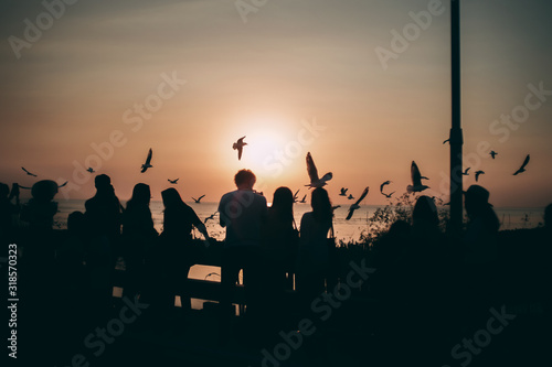 Silhouette of the sea on sunset background of the sky