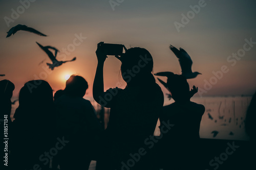 Silhouette of the sea on sunset background of the sky