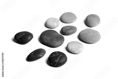 Pebbles  black and gray color smooth sea stones isolated on white background