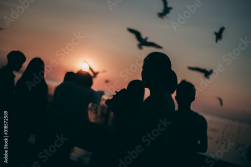 Silhouette of the sea on sunset background of the sky