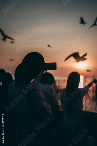 Silhouette of the sea on sunset background of the sky