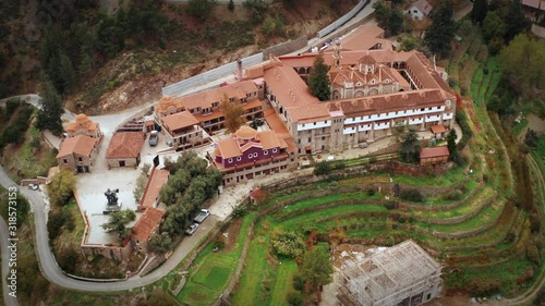 Aerial view of Machairas Monastery in Cyprus Mountains. Beautiful view of old religious mediterranean architecture in green nature landscape photo