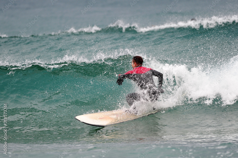 Korean Winter surfers at the Buheung-ri beach in Namjeong-Myeon, Yeongdeok-gun, South Korea. Korean Winter surfers at the Buheung-ri beach in Namjeong-Myeon, Yeongdeok-gun, South Korea.