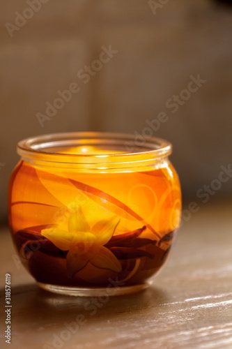 Aromatic candle in a glass jar