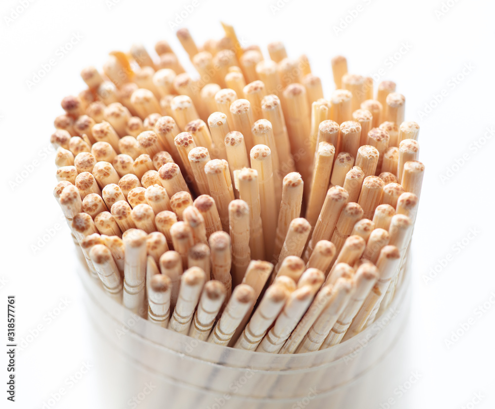 Wooden toothpicks on a white background Wooden toothpicks on a white background