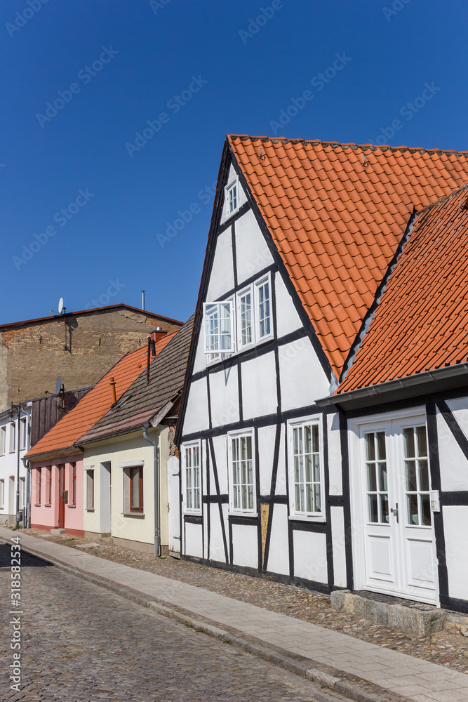 White half timbered house in the old town of Grimmen, Germany