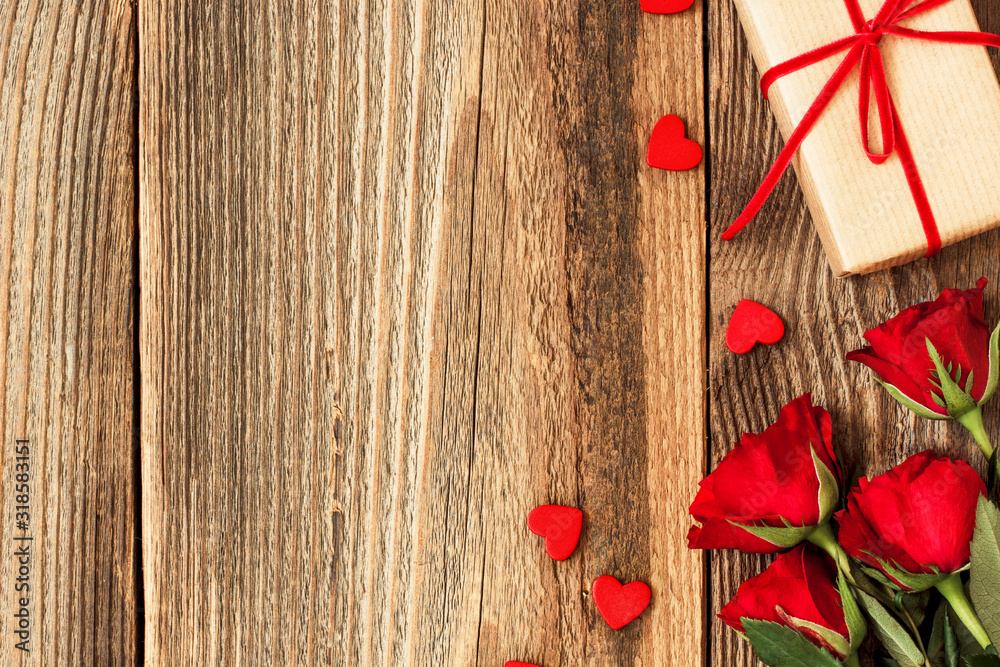 valentines day composition with roses, hearts and gift on wooden background valentines day composition with roses, hearts and gift on wooden background