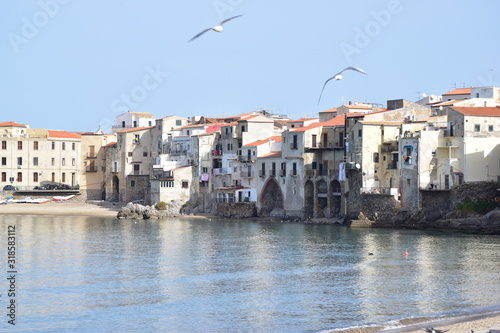 Veduta della città di Cefalù, Sicilia. Caseggiato antistante il Mare photo