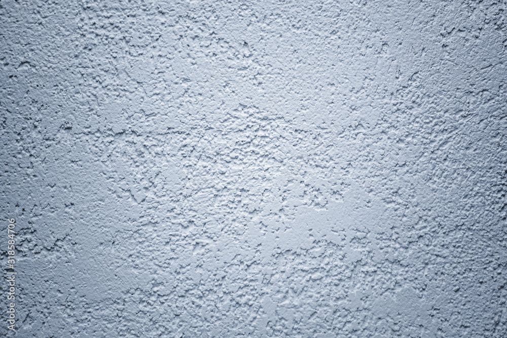 Wall plastered with putty bark beetle, background for design, gray wall with decorative plaster Wall plastered with putty bark beetle, background for design, gray wall with decorative plaster