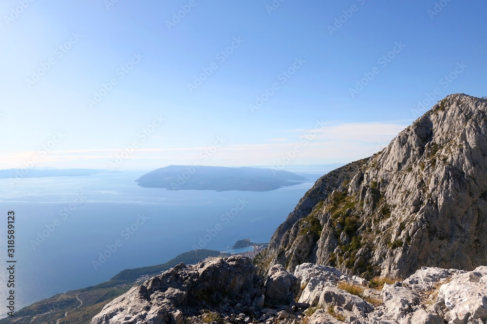 View from Biokovo mountain to town Makarska and islands Brac and Hvar in Dalmatia, Croatia. View from Biokovo mountain to town Makarska and islands Brac and Hvar in Dalmatia, Croatia.