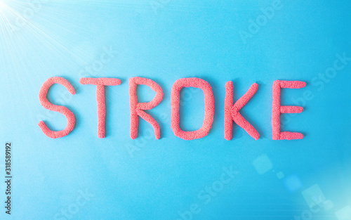 Stroke word in red letters on a blue background. Brain Vascular Stroke Disease Concept, haemorrhage photo