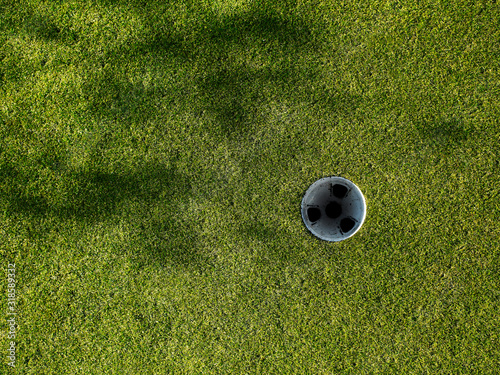 Golf hole with shadows