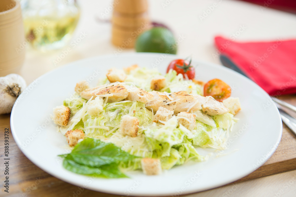 Homemade Vegetable salad with chicken and cheese on table Homemade Vegetable salad with chicken and cheese on table