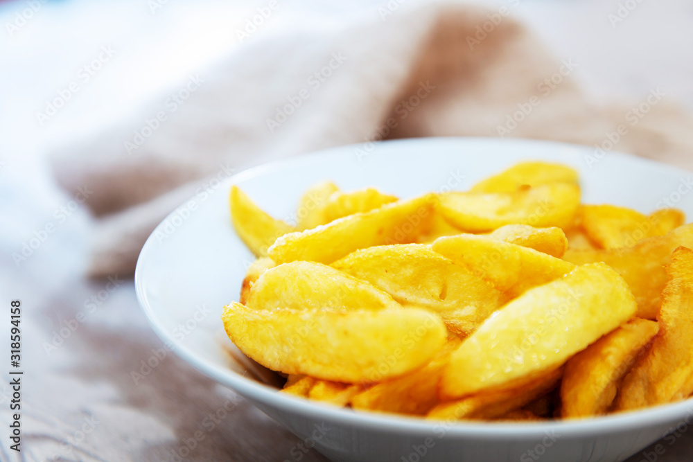 Golden French fries potatoes ready to be eaten Golden French fries potatoes ready to be eaten