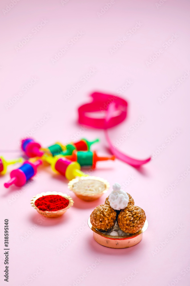 Indian festival makar sankranti concept, Sesame seed ball or til ke laddo, tilgul and Kite String Indian festival makar sankranti concept, Sesame seed ball or til ke laddo, tilgul and Kite String