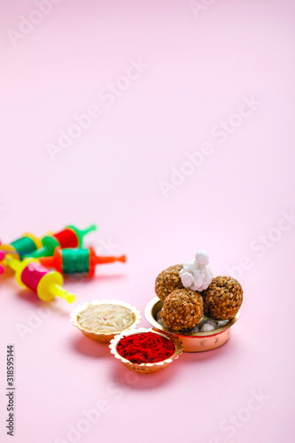 Indian festival makar sankranti concept, Sesame seed ball or til ke laddo, tilgul and Kite String 