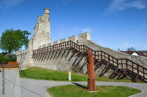 The city walls and The Cracow Gate - Szydlow, Poland.  photo