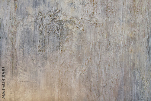 Gray texture of the surface in the form of a vertically smeared stone