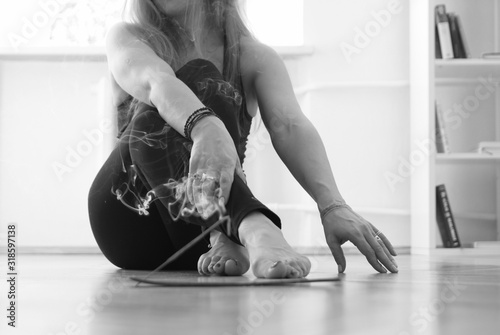 Yoga classes in the gym, at home, anywhere with flavored incense stiks photo