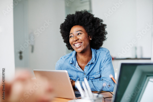 portrait young african american girl woman smiling office classroom