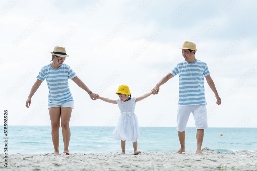 Happy family summer sea. beach vacation. Asia young people lifestyle travel enjoy fun and relax in holiday. Travel and Family Concept Happy family summer sea. beach vacation. Asia young people lifestyle travel enjoy fun and relax in holiday. Travel and Family Concept