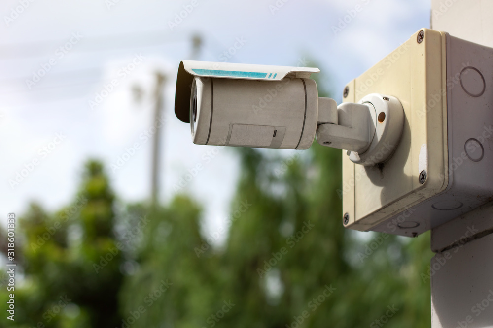 CCTV Security camera on building wall.