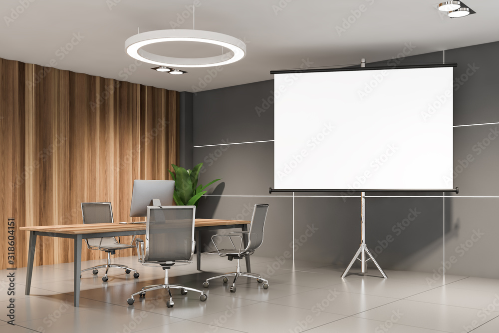 Fototapeta premium Gray and wooden CEO office with poster