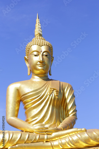 Buddhist statue with blue sky background 