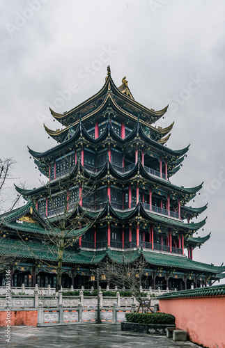 Ancient Hong'en Pagoda tower with green tiled red columns in Chongqing, southwest metropolis in China