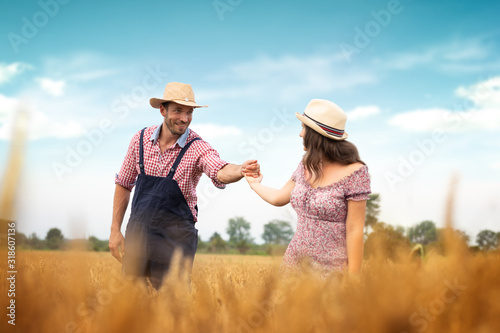 Affectionate couple having fun in field wheat © Cherries