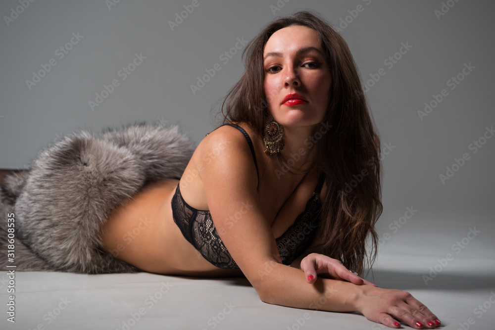 Naklejka premium Pretty young woman in lingerie
