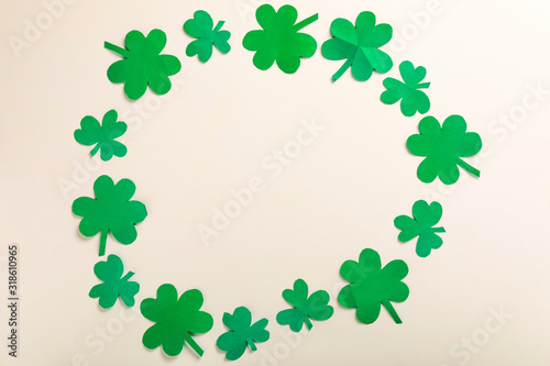 Happy Saint Patrick's mockup of shamrock clover leaves with copy space 