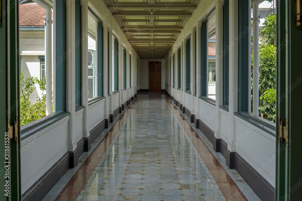 Open air corridor with marble tiled floor