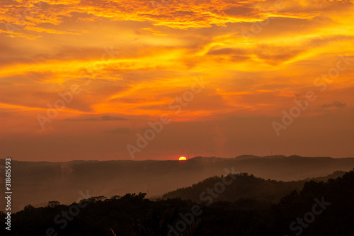 The sunset on Purba Volcano Mountain,Mount Api Purba. one of the tourist destination in Gunungkidul, Yogyakarta, Indonesia.