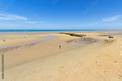 Remains of the temporary harbor used during the second world war  Arromanches  France