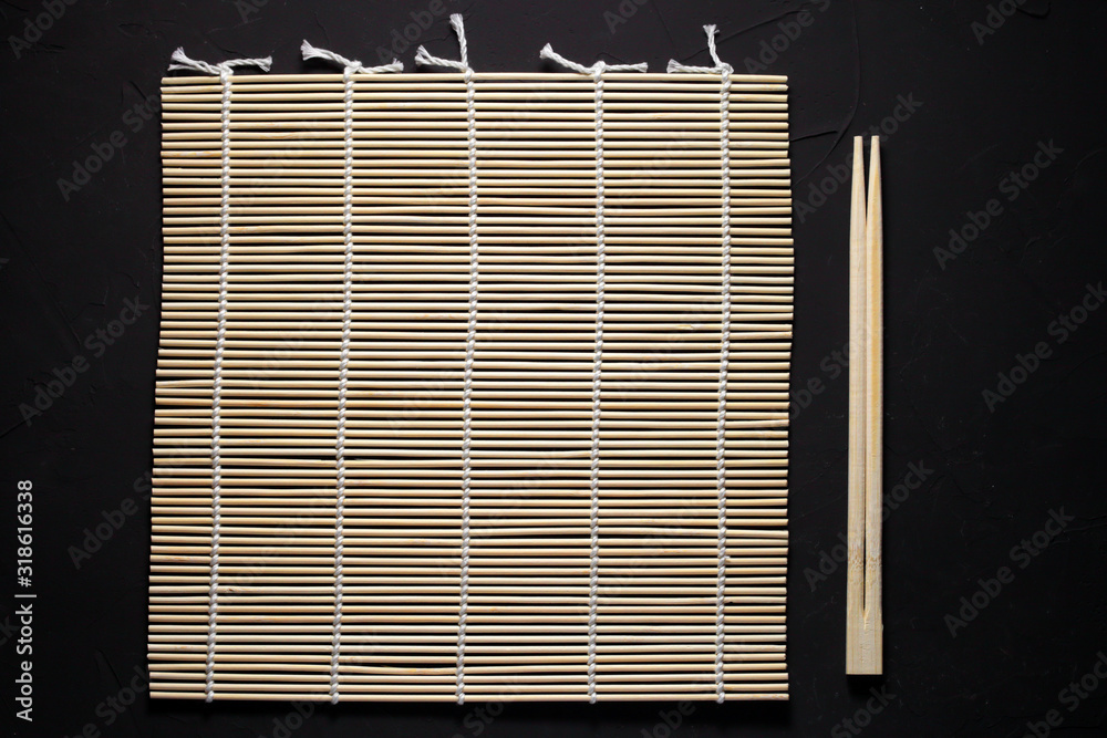 Fototapeta mat bamboo for sushi and rolls macro
