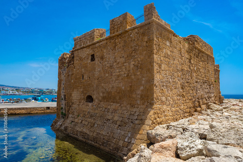 Fort on Paphos. Cyprus. Fortress on the beach of Paphos. Old fort on the coast of Cyprus. A tourist trip to pathos. The coast of the Mediterranean Sea.Famous places and beaches of Cyprus.Mediterranean